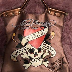 Kills love slowly. Mint condition Ed Hardy bag